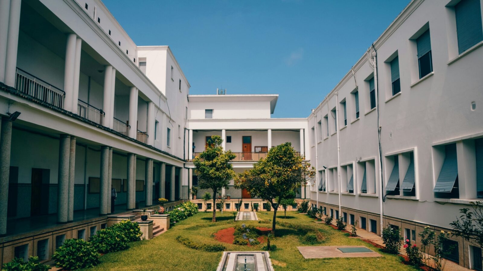 An internal courtyard of an institutional looking building