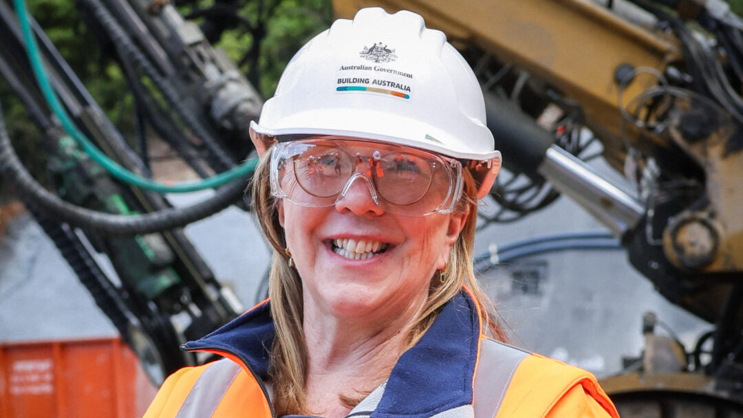 Catherine King Minister for Transport in orange high visibility jacket