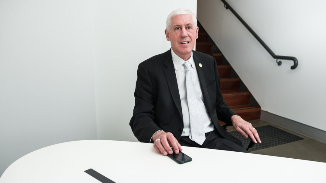 Graeme Innes, seated