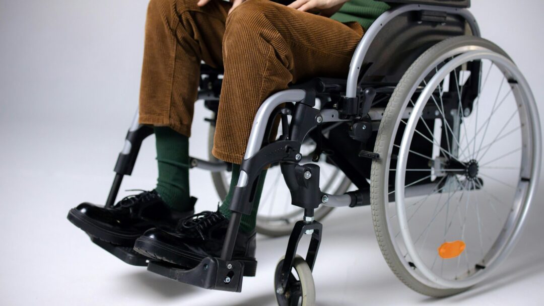 A person in a wheelchair.