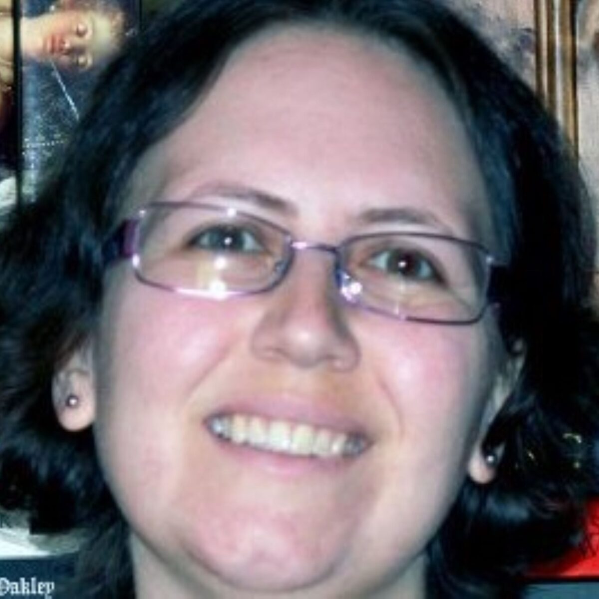Close-up of writer Nicki J Markus, smiling to camera.