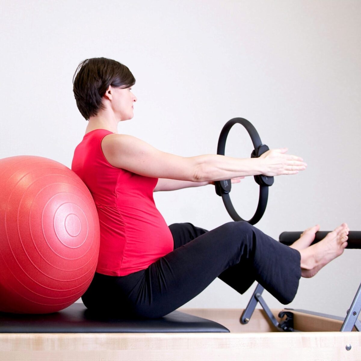 A pregnant person exercising